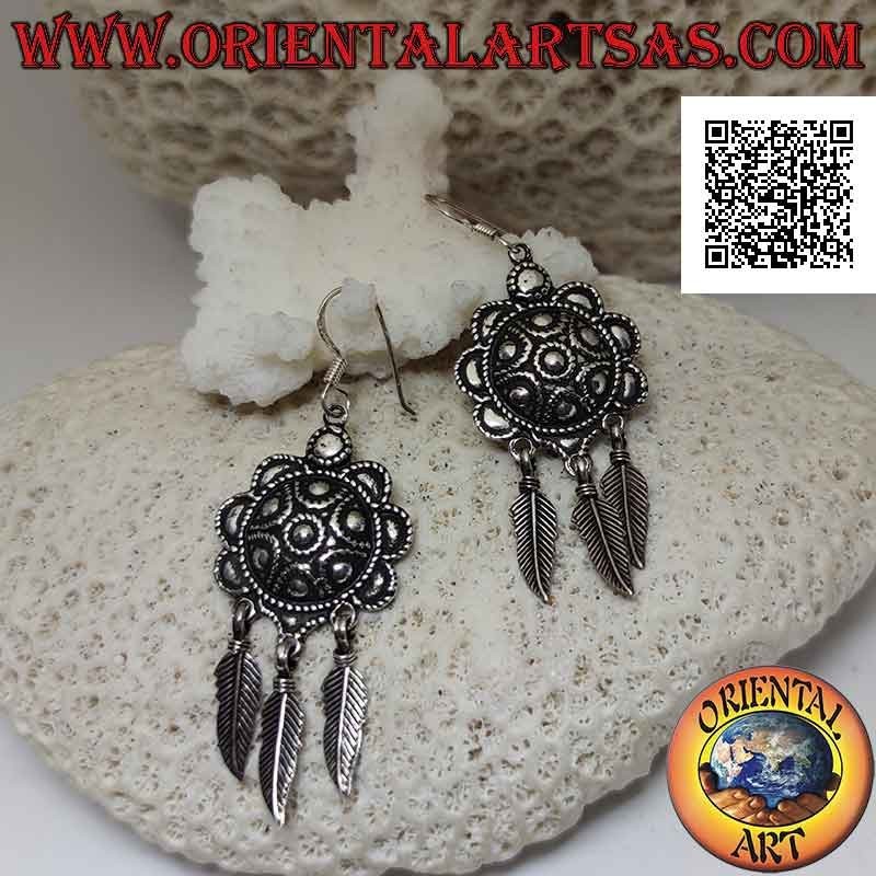 Silver earrings with relief chiselled shield and hanging feathers