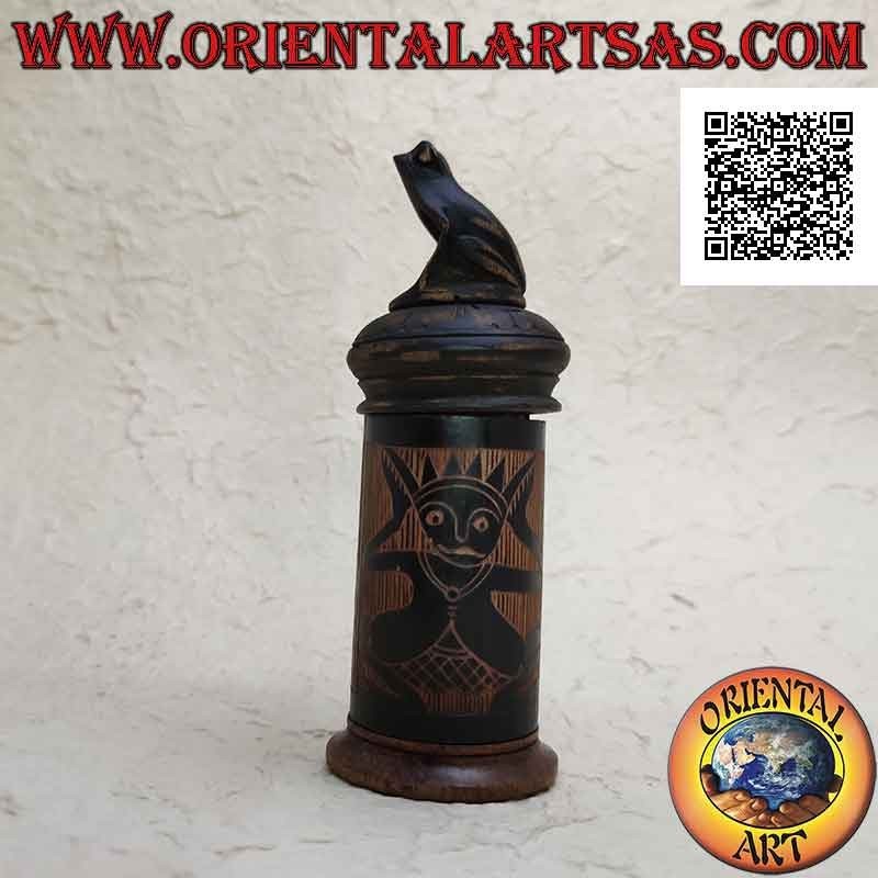 Cylindrical jewelry box with aboriginal engravings in bamboo and frog sitting in mahogany wood