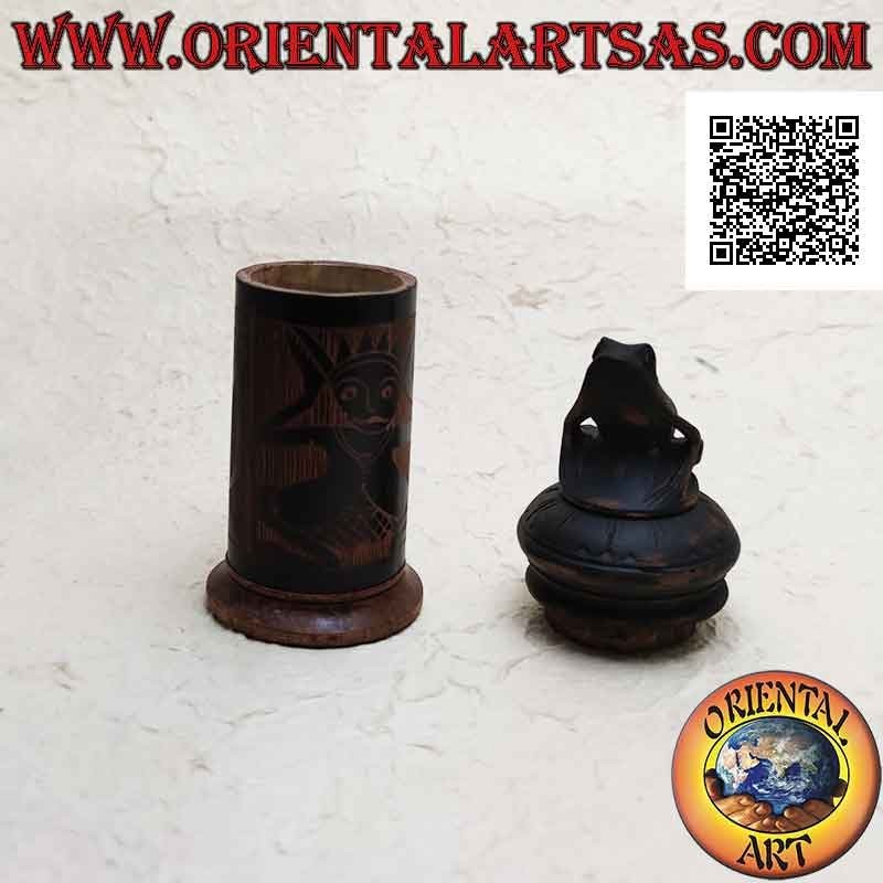 Cylindrical jewelry box with aboriginal engravings in bamboo and frog sitting in mahogany wood