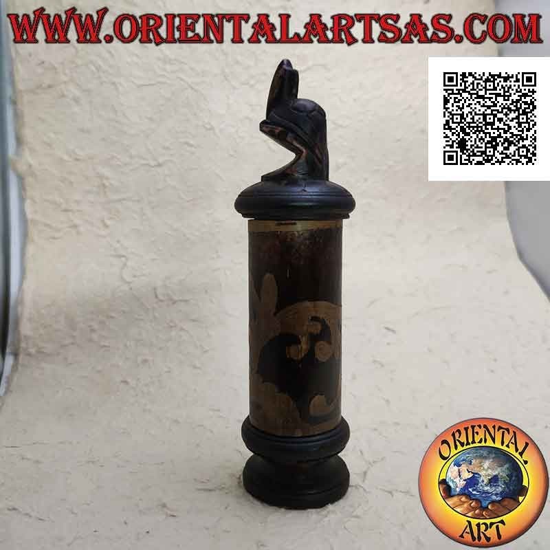 Cylindrical jewelry box with floral engravings in bamboo and turtle standing in mahogany wood