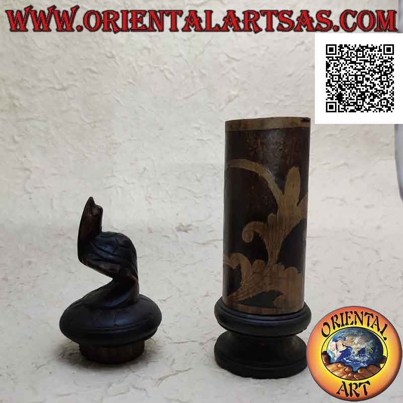 Cylindrical jewelry box with floral engravings in bamboo and turtle standing in mahogany wood