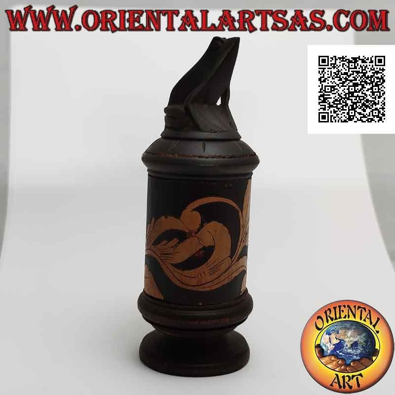Cylindrical jewelry box with floral engravings in bamboo and frog sitting in mahogany wood