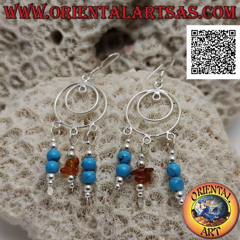 Pendientes de plata círculos concéntricos con colgantes de turquesa y cuentas de plata y fragmentos de ámbar