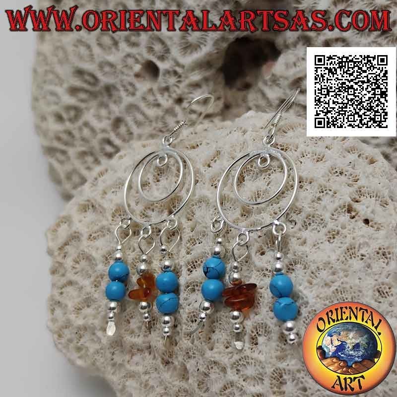 Concentric circles silver earrings with pendants of turquoise and silver beads and amber fragments