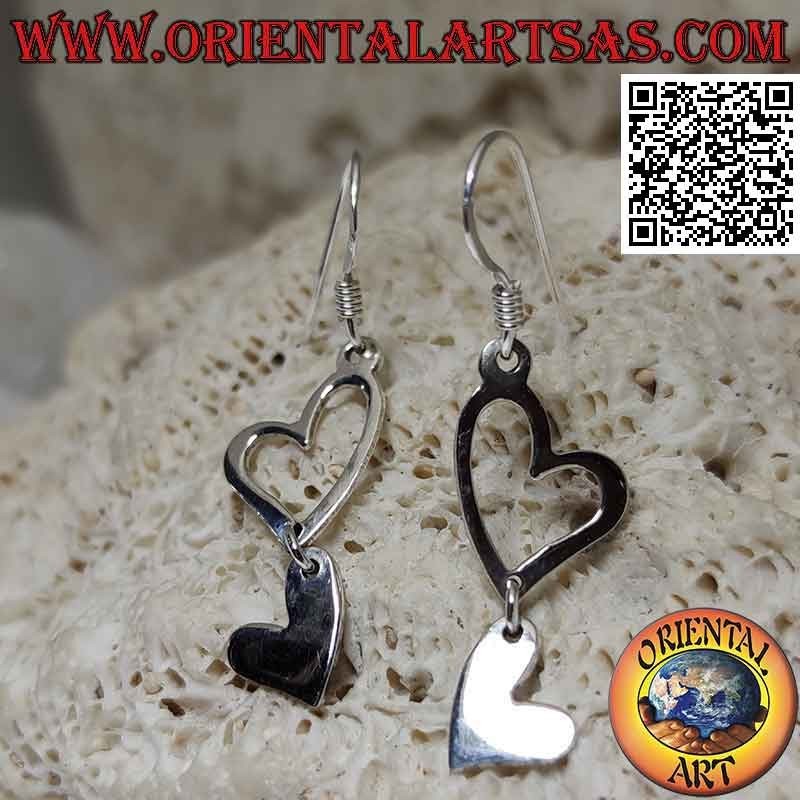 Orecchini in argento a monachella con due cuori complementari pendenti