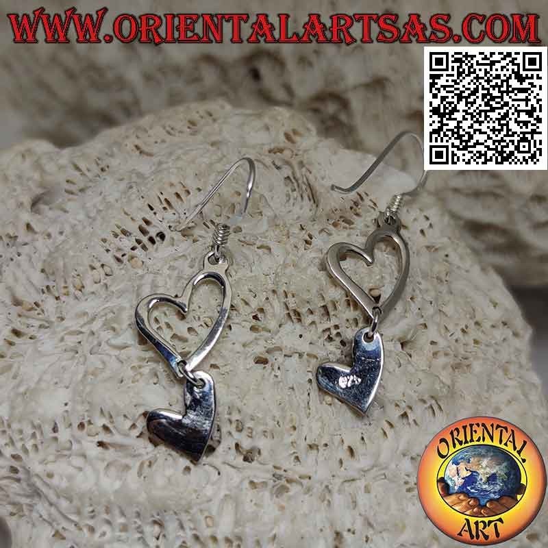 Orecchini in argento a monachella con due cuori complementari pendenti