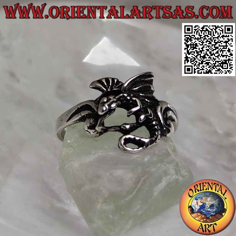 Silver ring with basilisk dragon in profile flight