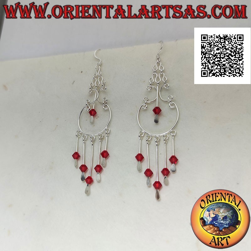 Baroque style silver hoop earrings with red crystals hanging in the center and below