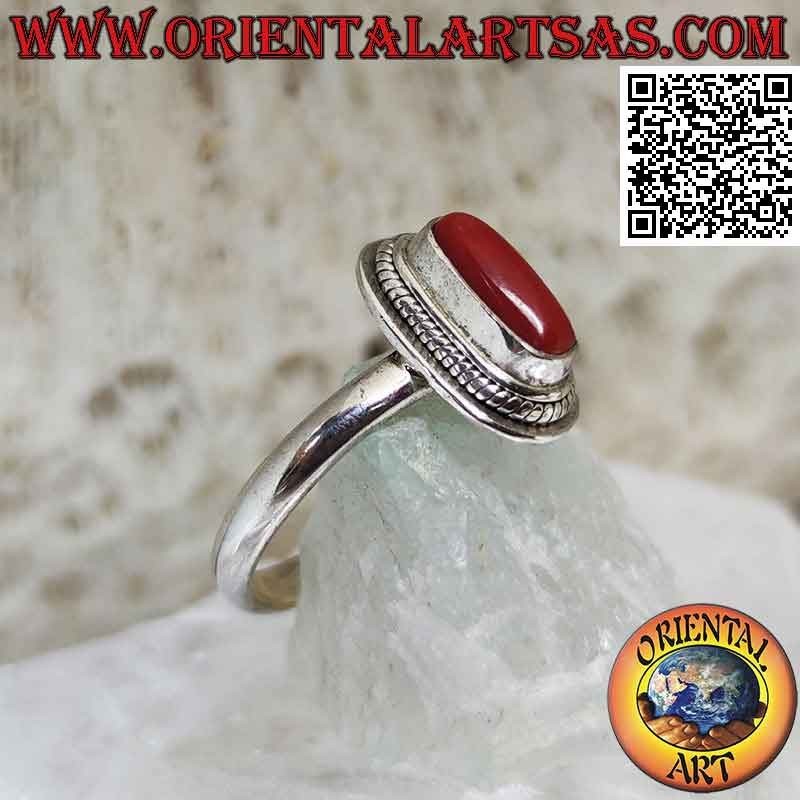Silver ring with natural coral set in a braided edge (19b)