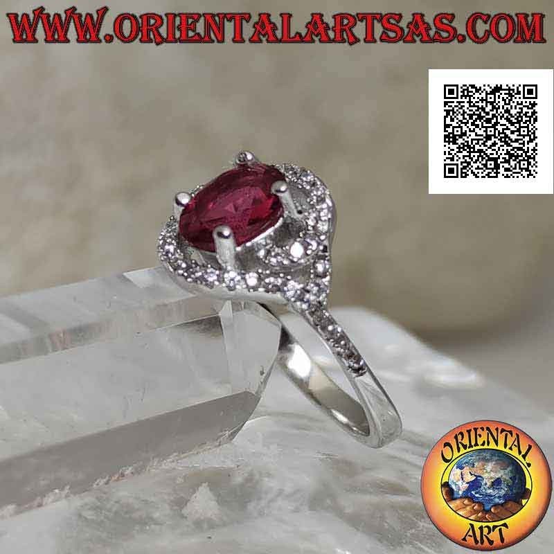 Silver ring with oval synthetic ruby wrapped in a zircon spiral
