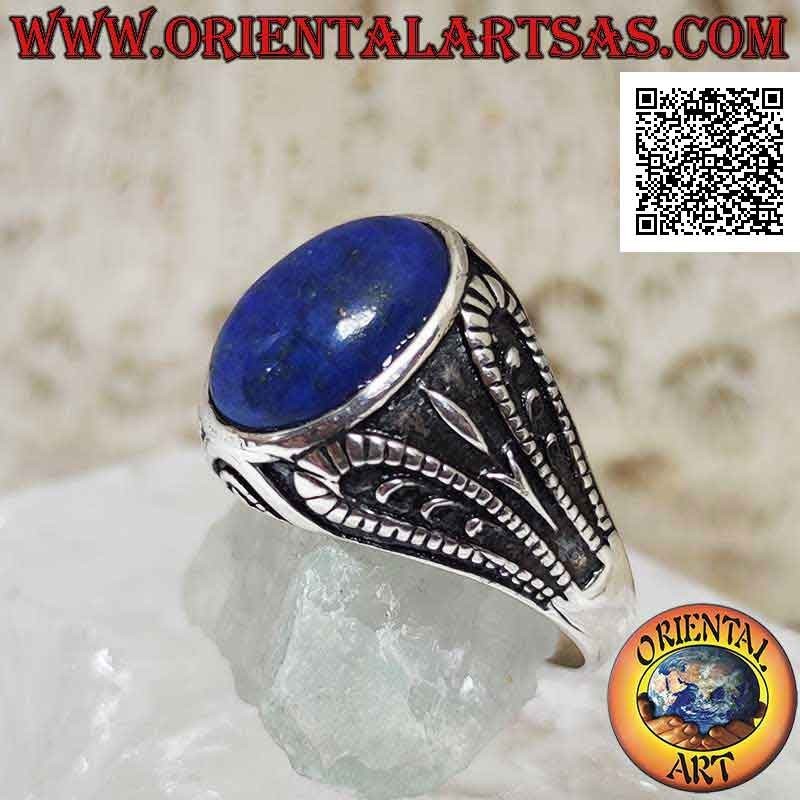 Silver ring with oval cabochon lapis lazuli and symmetrical decoration in bas-relief on the sides