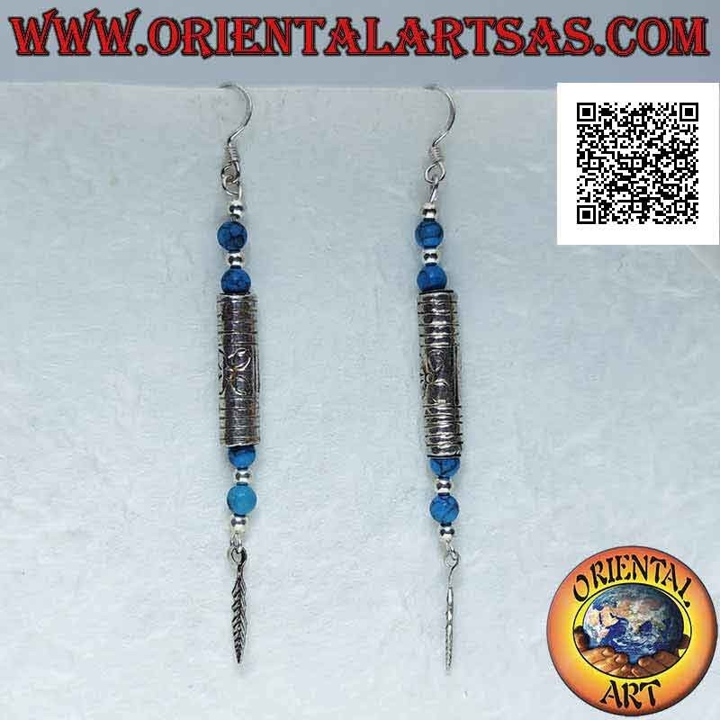 Silver tube earrings decorated with turquoise pearls above and below and dangling feathers