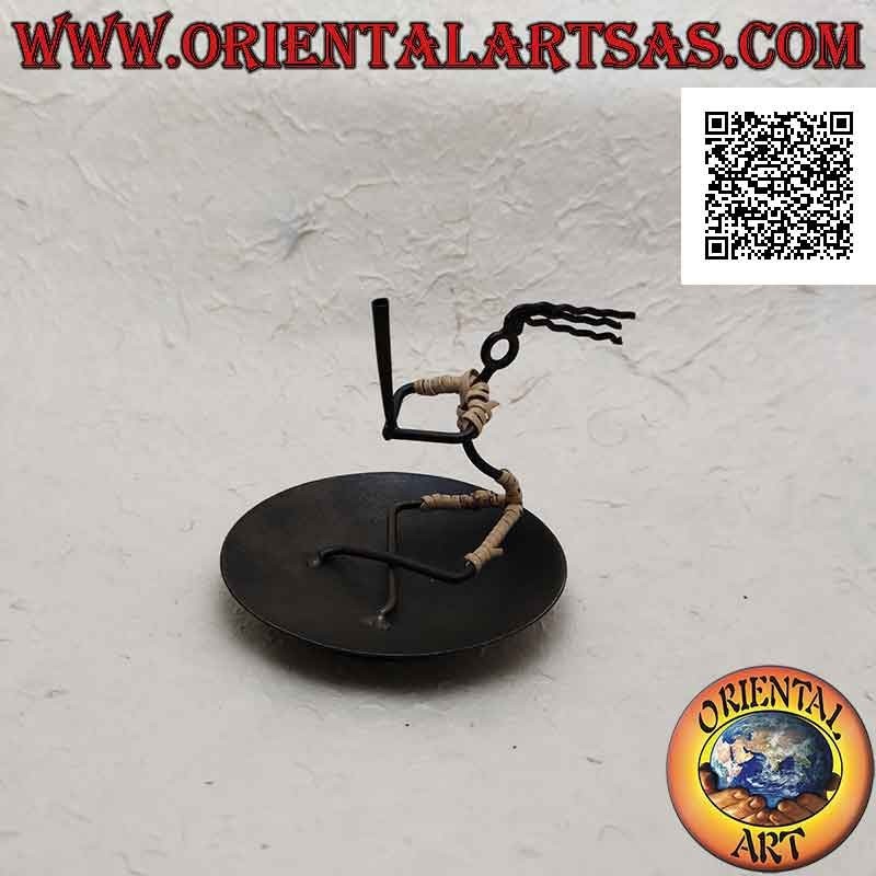 Round wrought iron incense burner, sitting man holding the torch