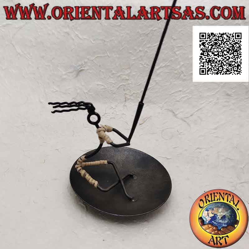 Round wrought iron incense burner, sitting man holding the torch