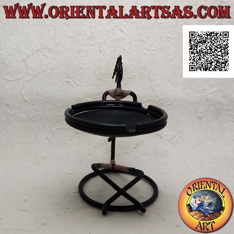 Wrought iron ashtray, sitting man holding up the plate