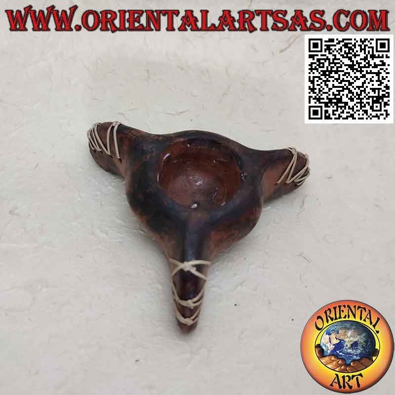 Three-footed candle holder in terracotta and decorations with bark