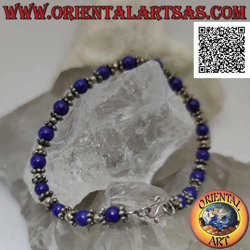 Silver bracelets with lapis lazuli and silver spheres strung alternately and inserts in the middle of 18.5 cm