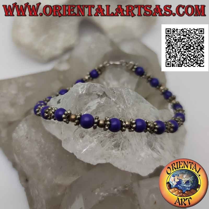 Silver bracelets with lapis lazuli and silver spheres strung alternately and inserts in the middle of 18.5 cm