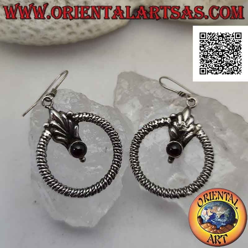 Silver leverback earrings with thick intertwined circle and garnet on a central flower