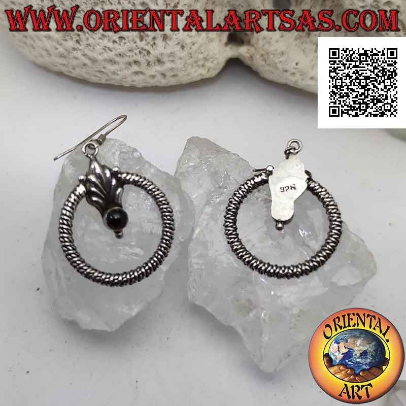 Silver leverback earrings with thick intertwined circle and garnet on a central flower