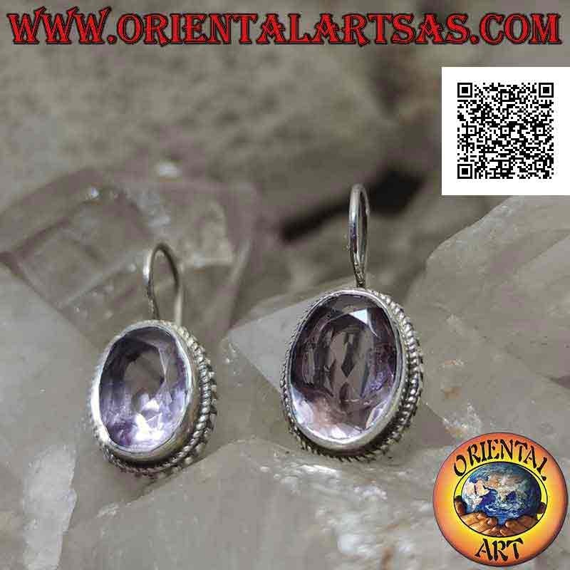 Silver earrings with natural oval faceted clear amethyst surrounded by weaving