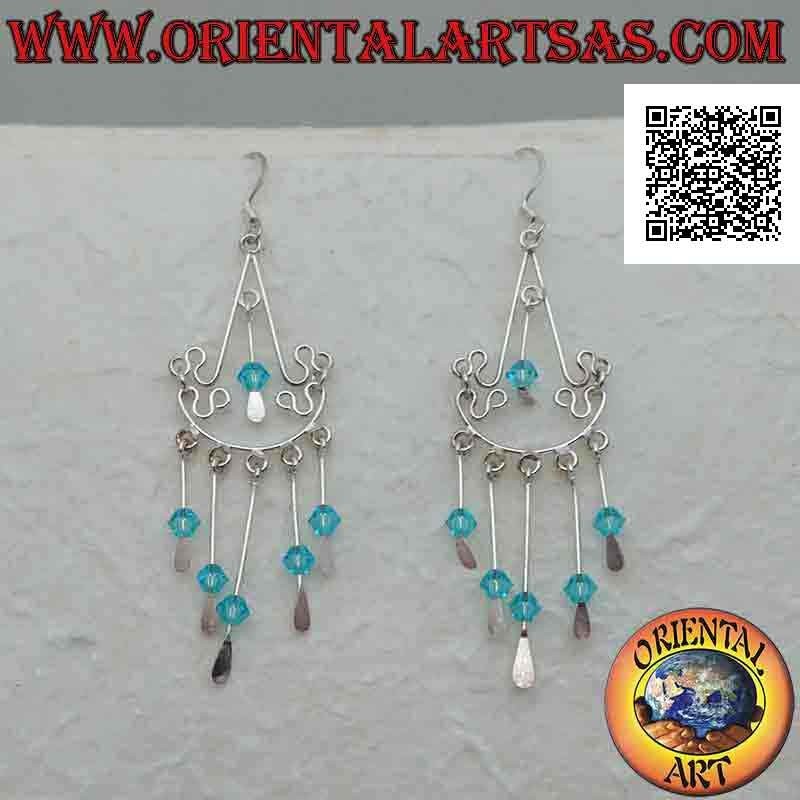 Baroque style silver arc earrings with blue crystals hanging in the center and below