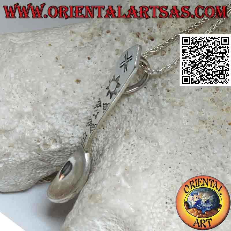 Silver pendant in the shape of a spoon with engraved astral symbols