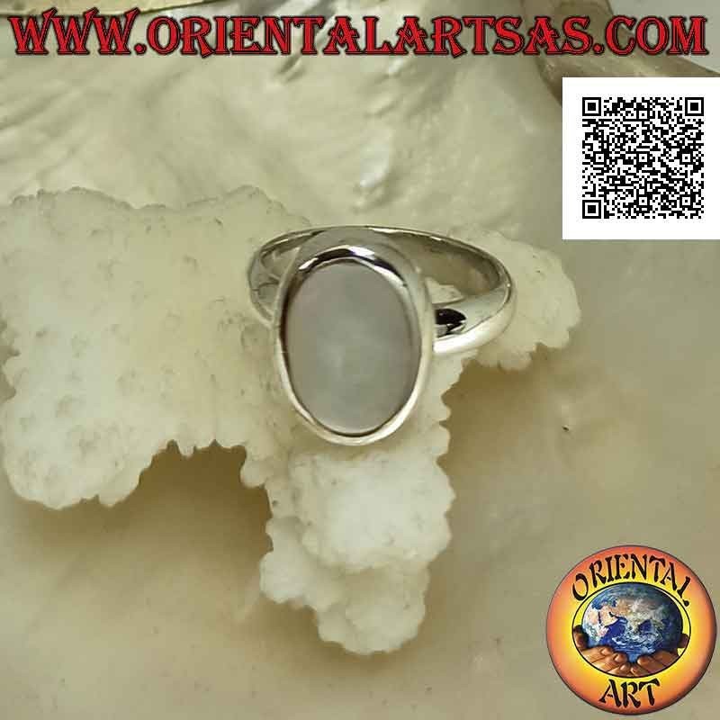 Silver ring with flat oval mother of pearl flush with the edge on a smooth band
