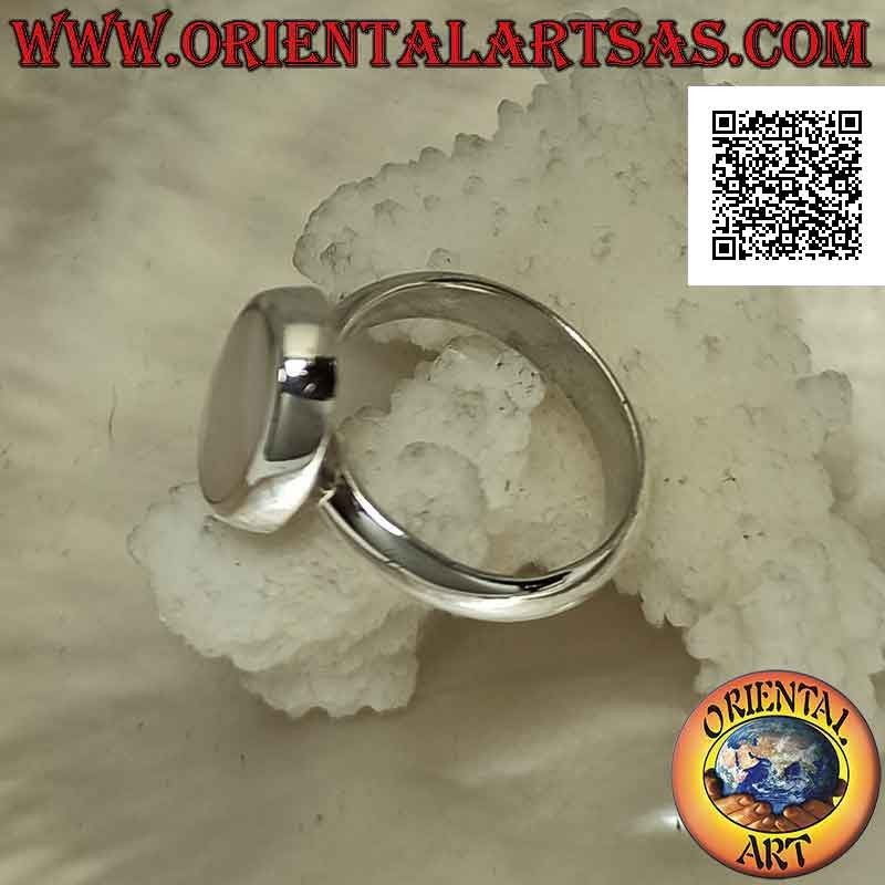 Silver ring with flat oval mother of pearl flush with the edge on a smooth band