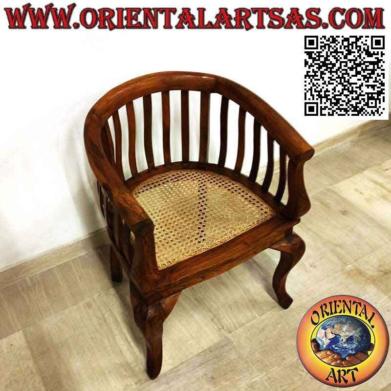 Sillón "redondo" moderno en madera de teca y asiento de paja de Viena