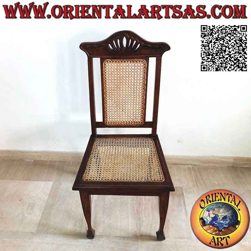 Colonial style chair with lotus flower, in teak wood and Vienna straw seat and back