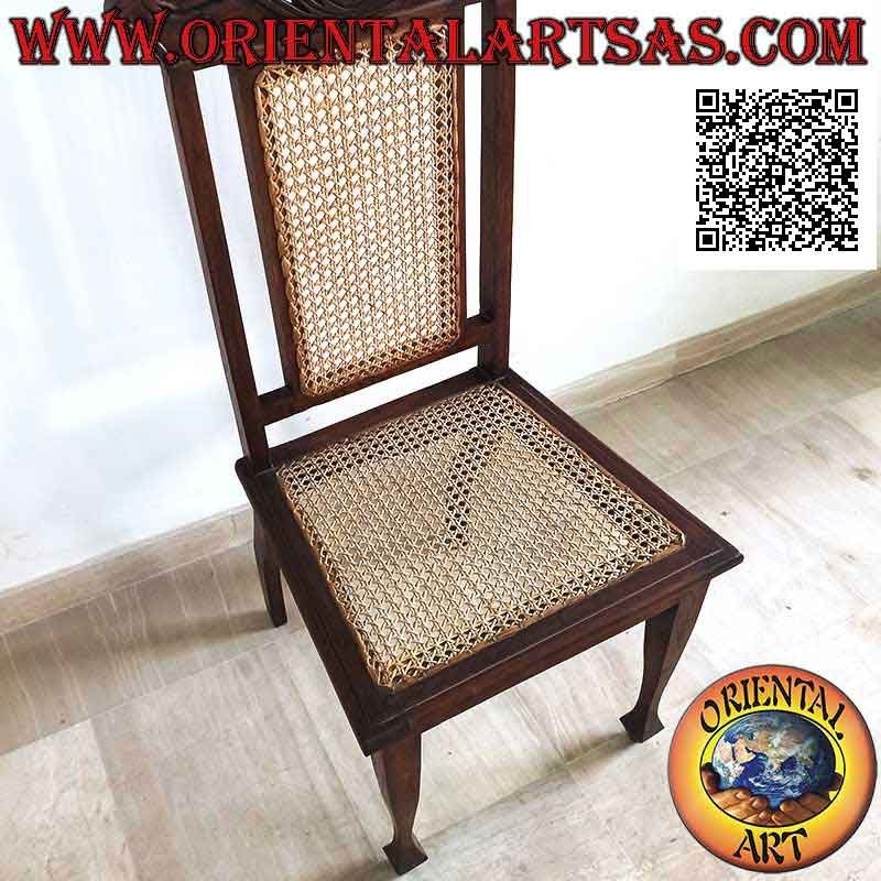 Chaise de style colonial avec fleur de lotus, en bois de teck et assise et dossier en paille de Vienne