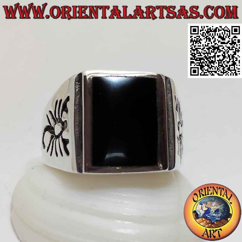 Silver ring with rectangular flush onyx and scorpion engraved on the sides