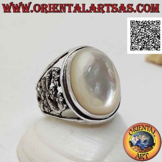 Silver ring with oval cabochon mother-of-pearl and double dragon intertwined on a perforated background on the sides