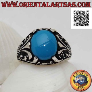 Silver ring with oval cabochon turquoise set with floral decoration with lily on the sides