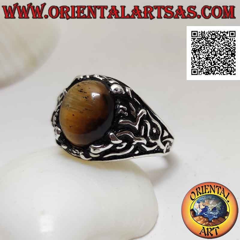Silver ring with cabochon oval tiger eye set with floral decoration on the sides