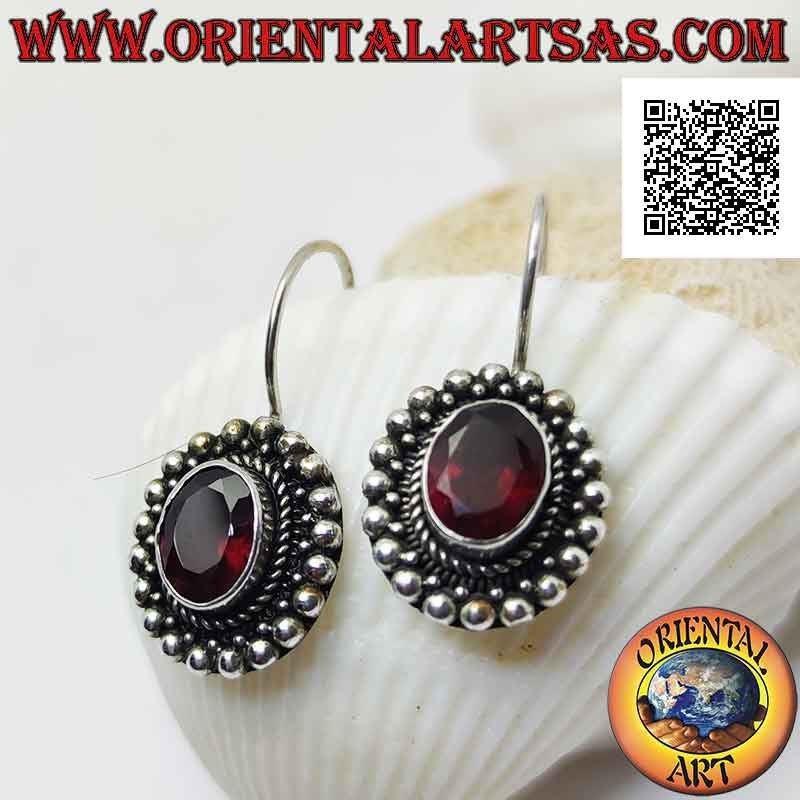 Silver pendant earrings with faceted oval garnet surrounded by intertwining and balls