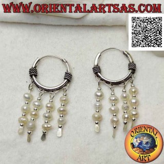 Silver earring, 18 mm worked circle with twisted interlacing and row of three hanging freshwater pearls