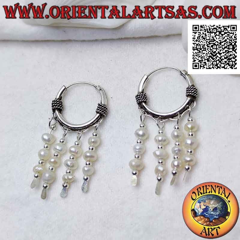 Silver earring, 18 mm worked circle with twisted interlacing and row of three hanging freshwater pearls