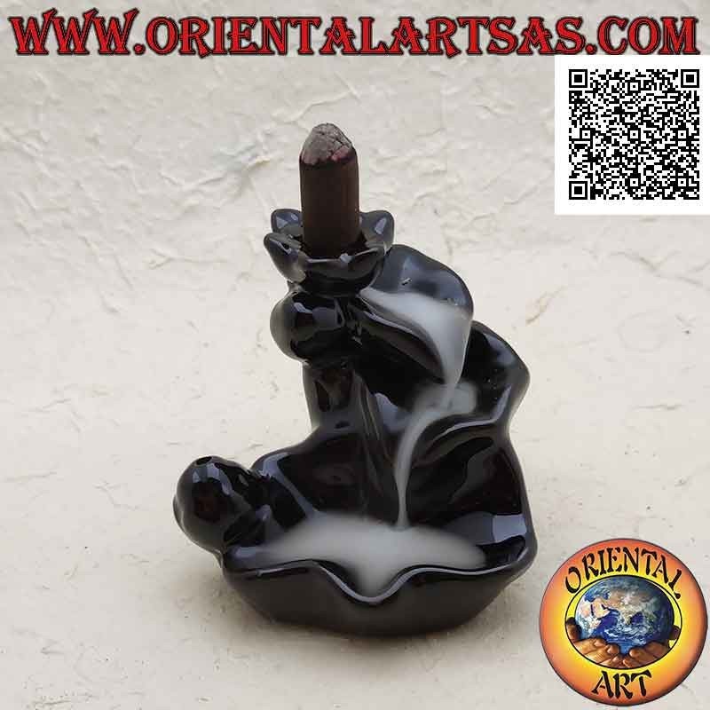 Cone shaped incense burner in the shape of a fountain of leaves for cascading smoke effect, in ceramic
