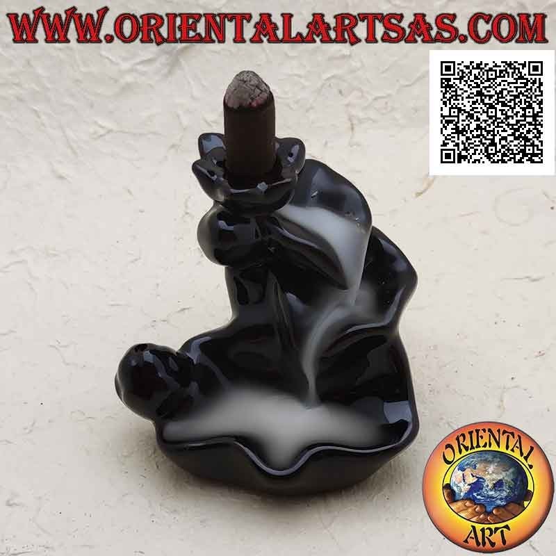 Cone shaped incense burner in the shape of a fountain of leaves for cascading smoke effect, in ceramic