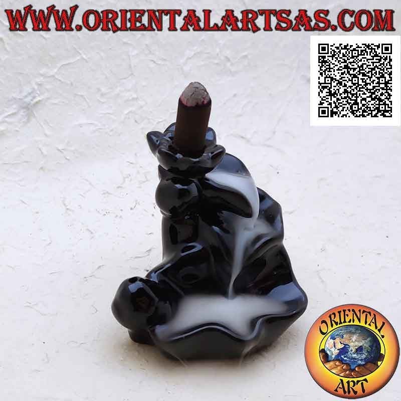 Cone shaped incense burner in the shape of a fountain of leaves for cascading smoke effect, in ceramic