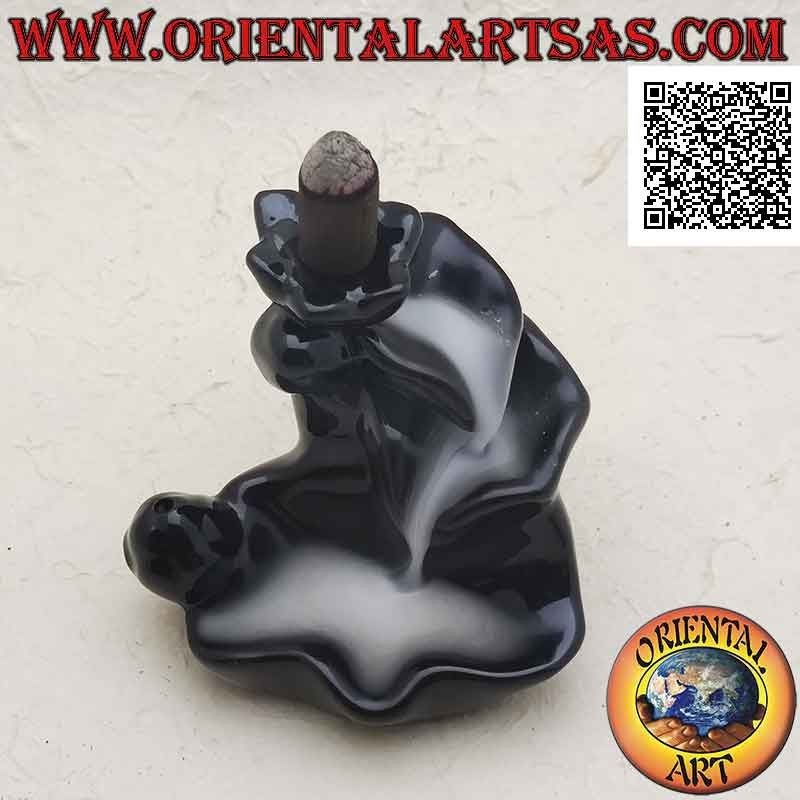 Cone shaped incense burner in the shape of a fountain of leaves for cascading smoke effect, in ceramic