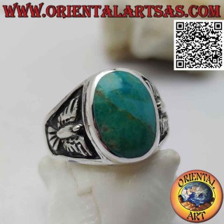 Silver ring with natural oval turquoise and bas-relief eagle on the sides (24)