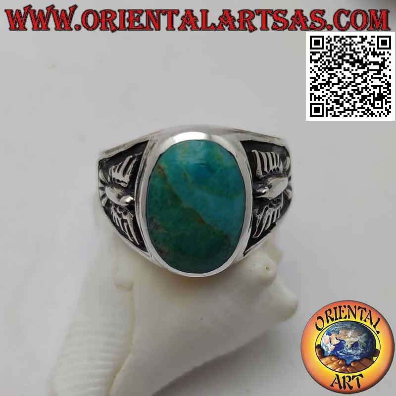 Silver ring with natural oval turquoise and bas-relief eagle on the sides (24)