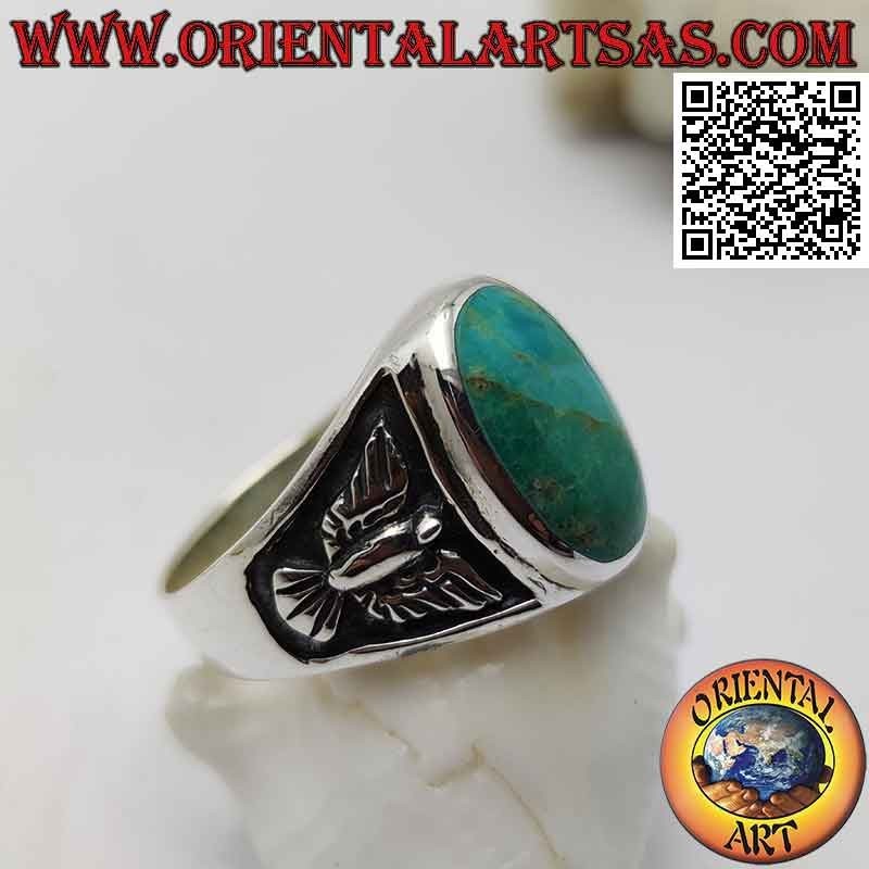 Anillo de plata con turquesa ovalada natural y águila en bajorrelieve en los laterales (24)