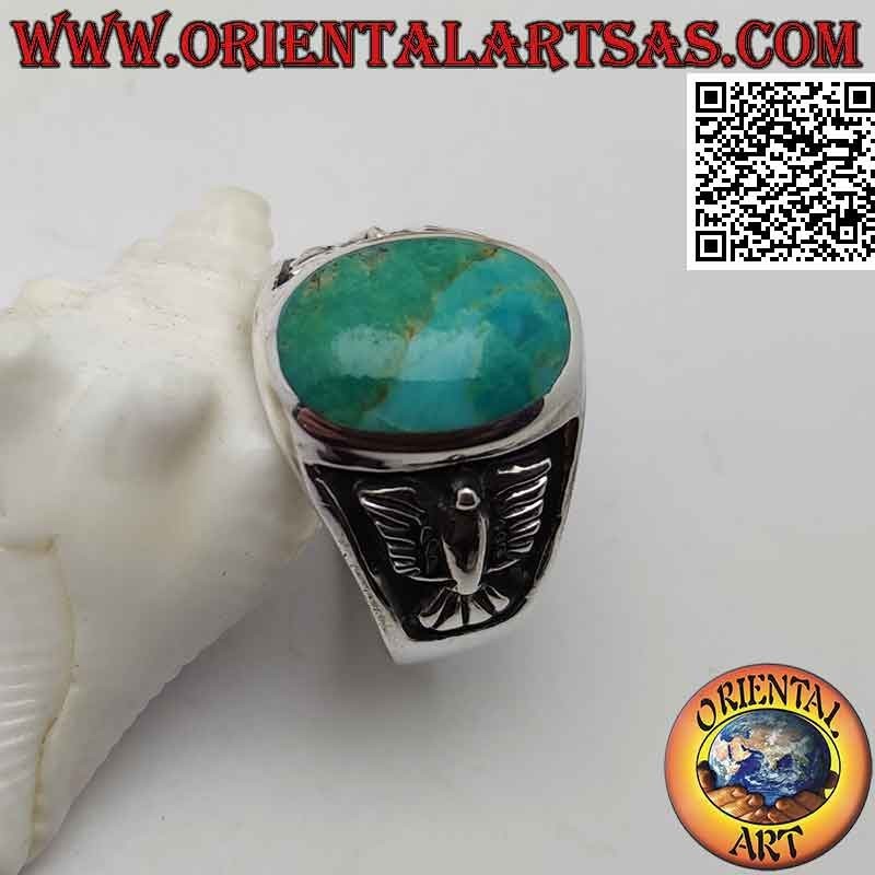 Silver ring with natural oval turquoise and bas-relief eagle on the sides (24)