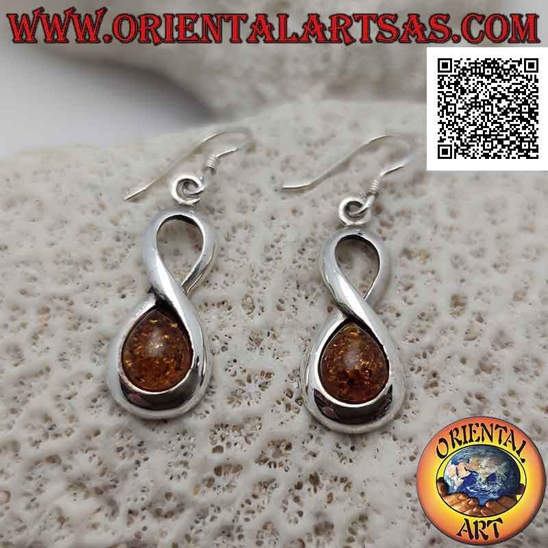 Boucles d'oreilles à crochet en argent lisse de forme infini avec une goutte d'ambre cabochon dans l'un des deux cercles
