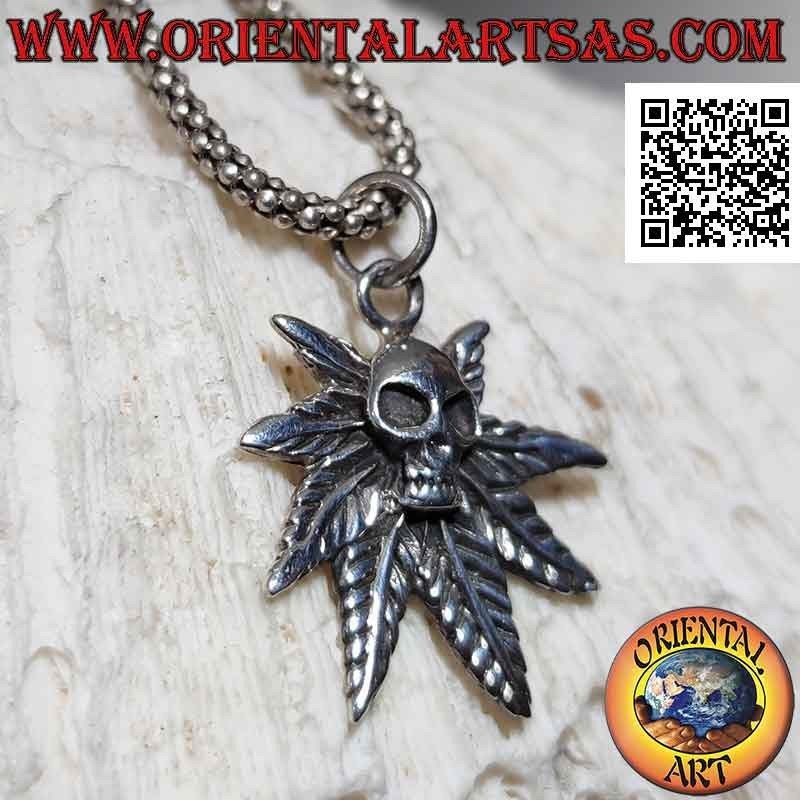 Silver pendant, skull on marijuana leaf
