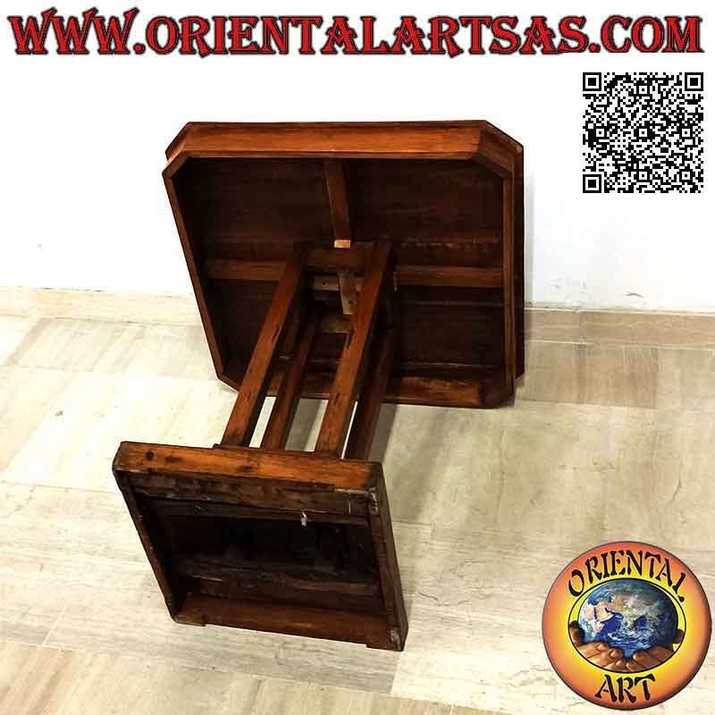 Square living room table with square central foot in antique teak wood